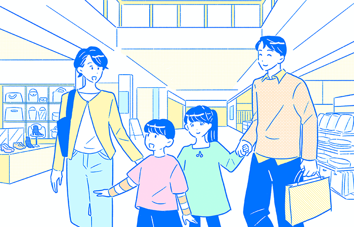 田中さん家族と笑顔で街中を歩いている様子のイラスト