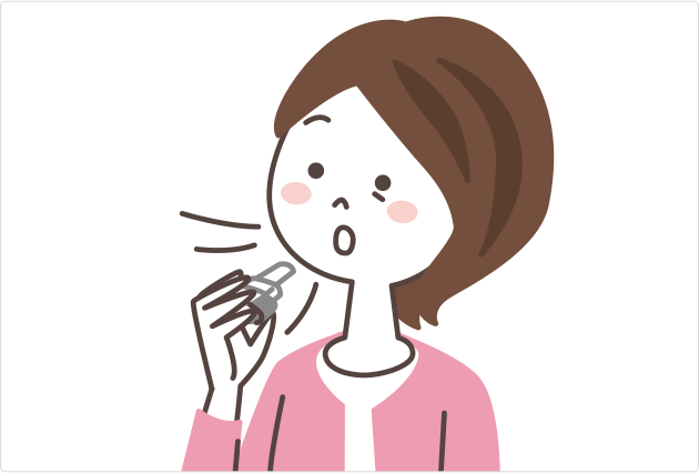 イメージ:ブリーズヘラー®を口から離して吸入している
